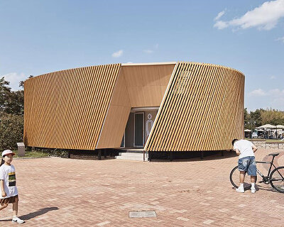 double-layer timber facade enfolds renovated public toilet in korea by daniel valle architects