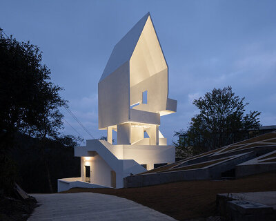 kong xiangwei studio's flying bird art gallery frames the rolling tea gardens of china