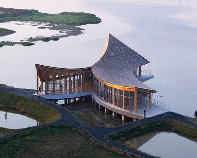 primary architects tops fuzhouji village center with curving, geometric rooftop