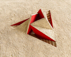 geometric triskele form rises from the earth as hajime yoshida's shrine in japan