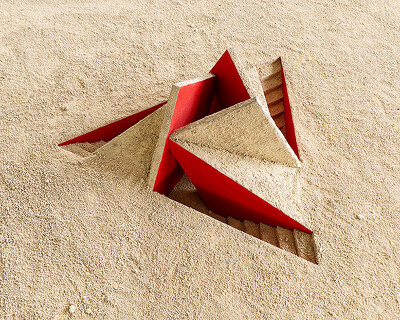 geometric triskele form rises from the earth as hajime yoshida's shrine in japan
