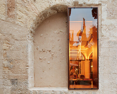 mallorca's hotel nobis palma preserves historic stone with steel interventions