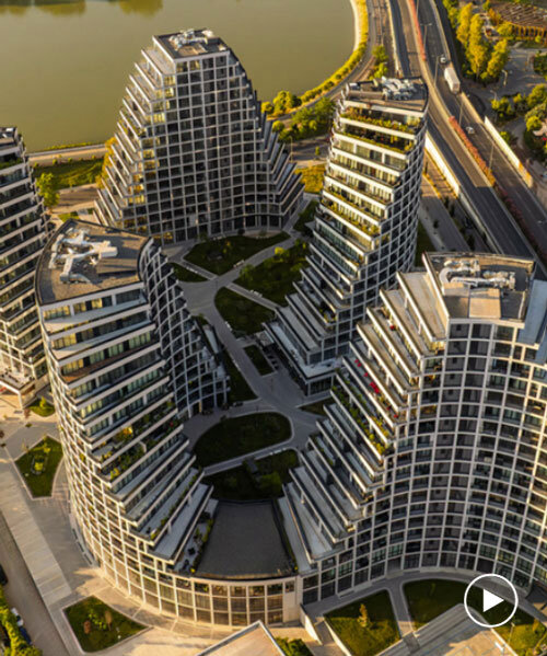 JA joubert architecture sculpts undulating lakefront district following sloped terrain in tirana