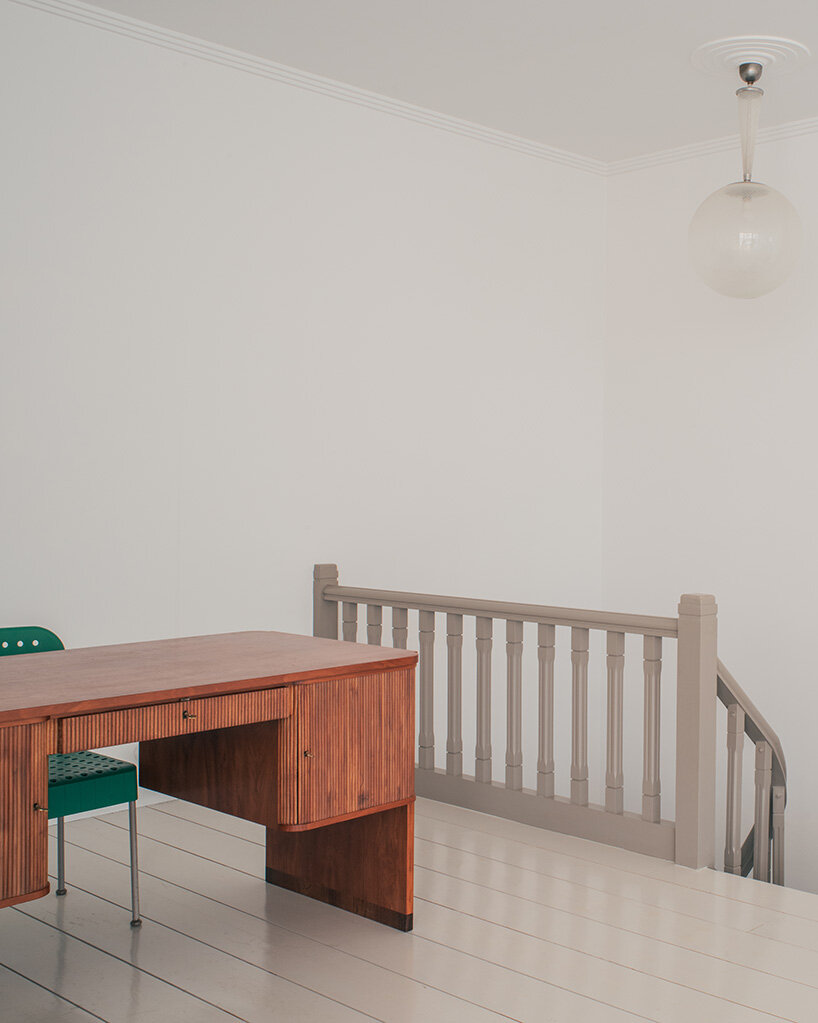 local local turns century-old shop into contemporary art gallery beneath the acropolis