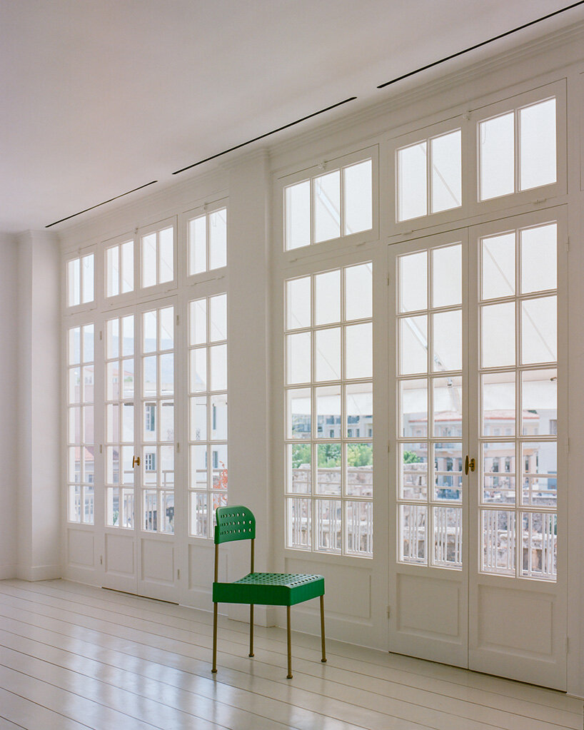 local local turns century-old shop into contemporary art gallery beneath the acropolis