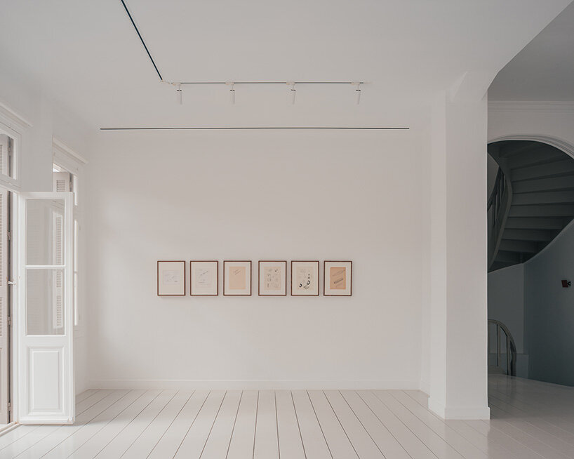 local local turns century-old shop into contemporary art gallery beneath the acropolis