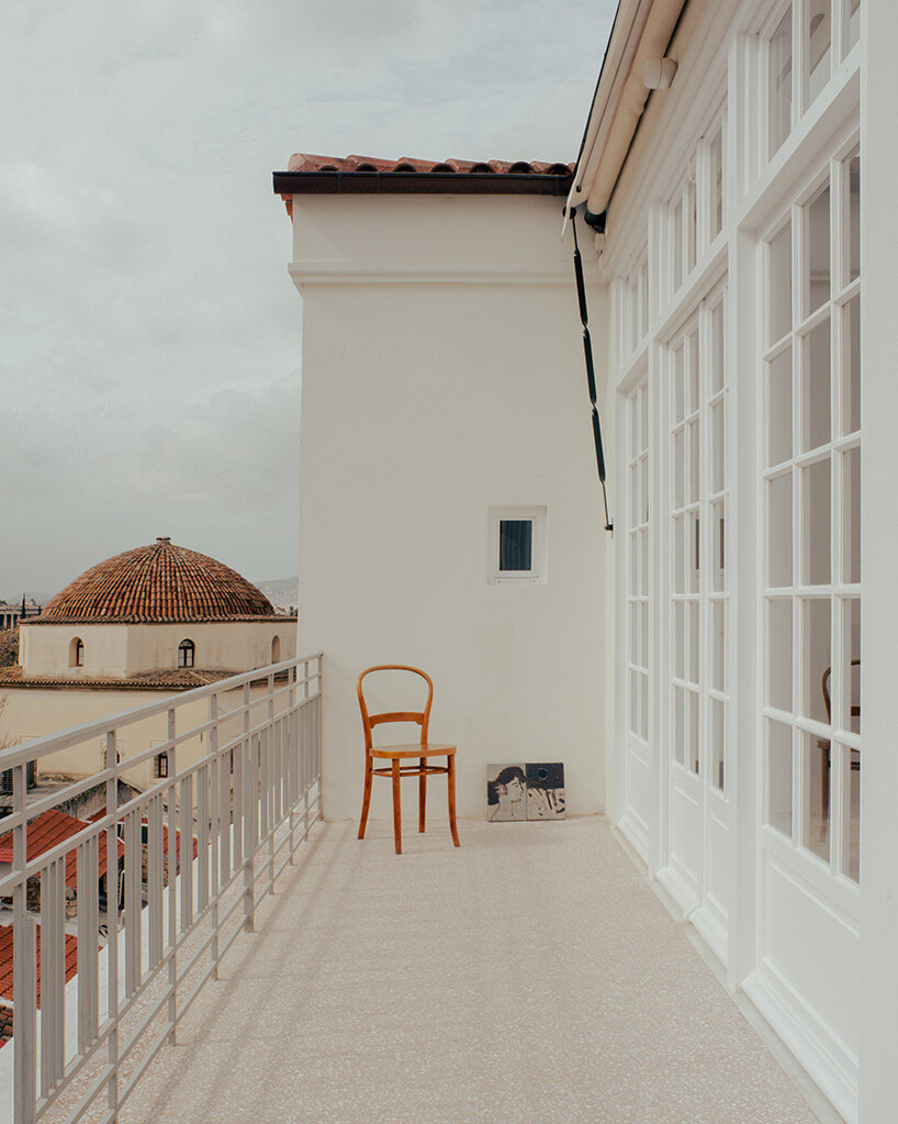 local local turns century-old shop into contemporary art gallery beneath the acropolis