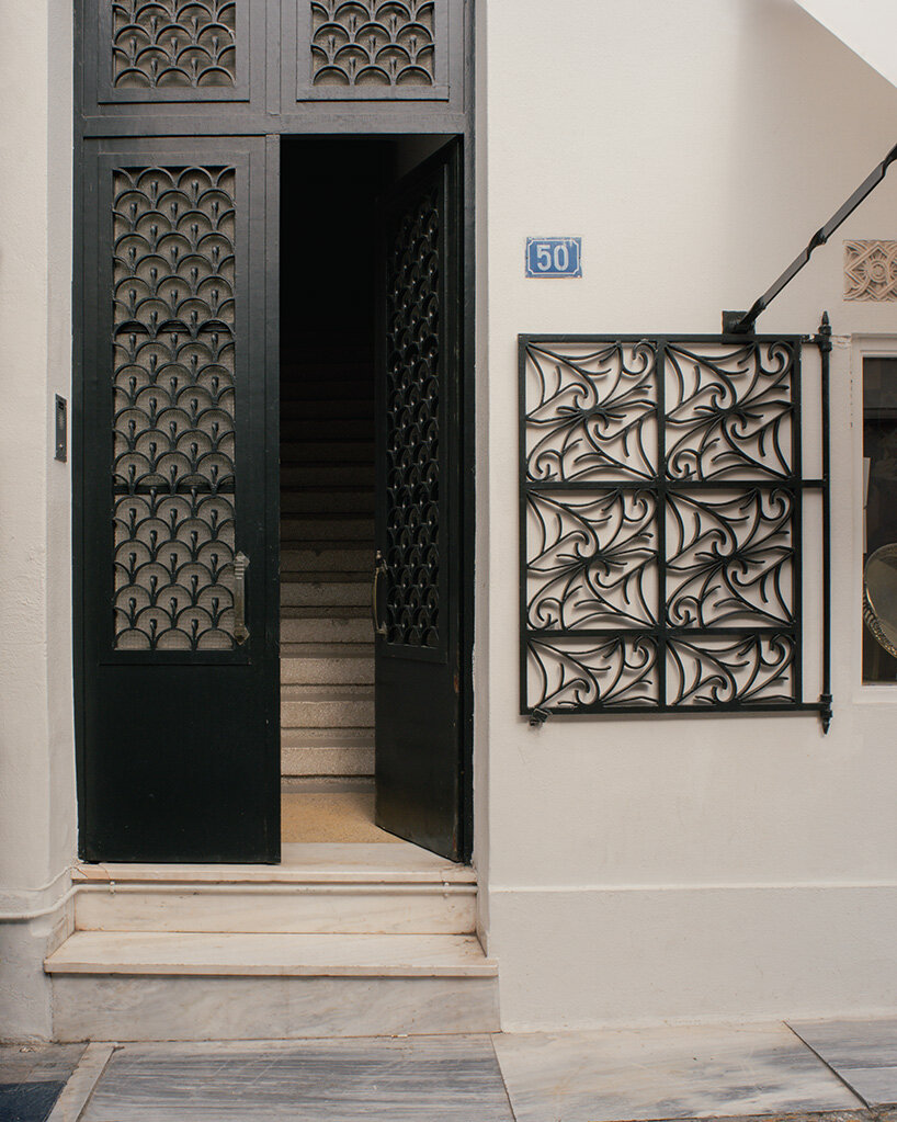 local local turns century-old shop into contemporary art gallery beneath the acropolis