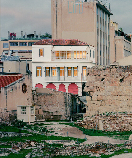 local local turns century-old shop into contemporary art gallery beneath the acropolis