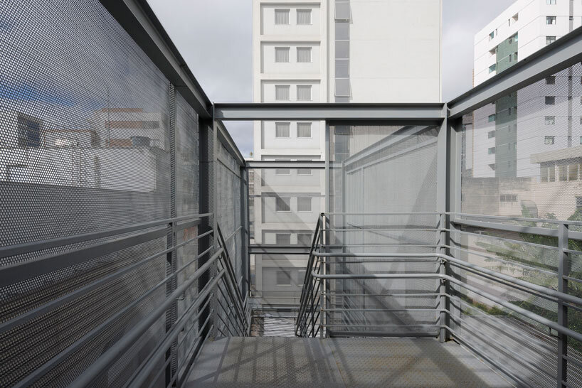 former bank in brazil transforms into vibrant magnum lourdes college by biri + chico albano