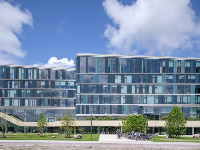 glazed ceramic tiles adorn hybrid timber office building's facade by team v in amsterdam