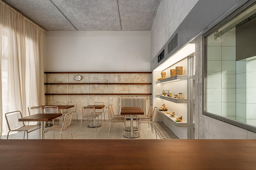 inside this milan wine bar, studiomille creates a cozy gathering space rooted in filipino culture