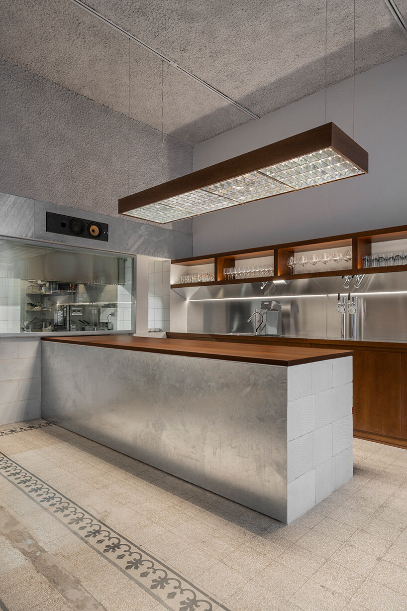 inside this milan wine bar, studiomille creates a cozy gathering space rooted in filipino culture