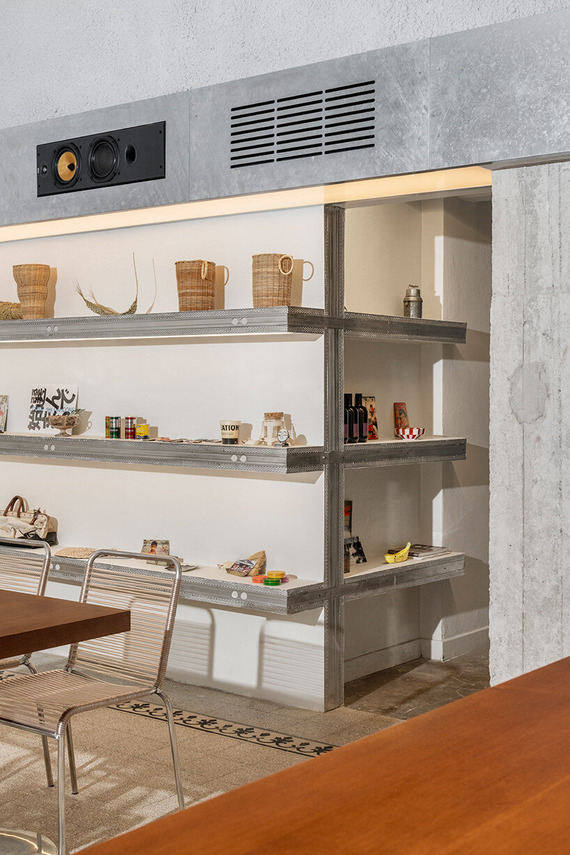 inside this milan wine bar, studiomille creates a cozy gathering space rooted in filipino culture