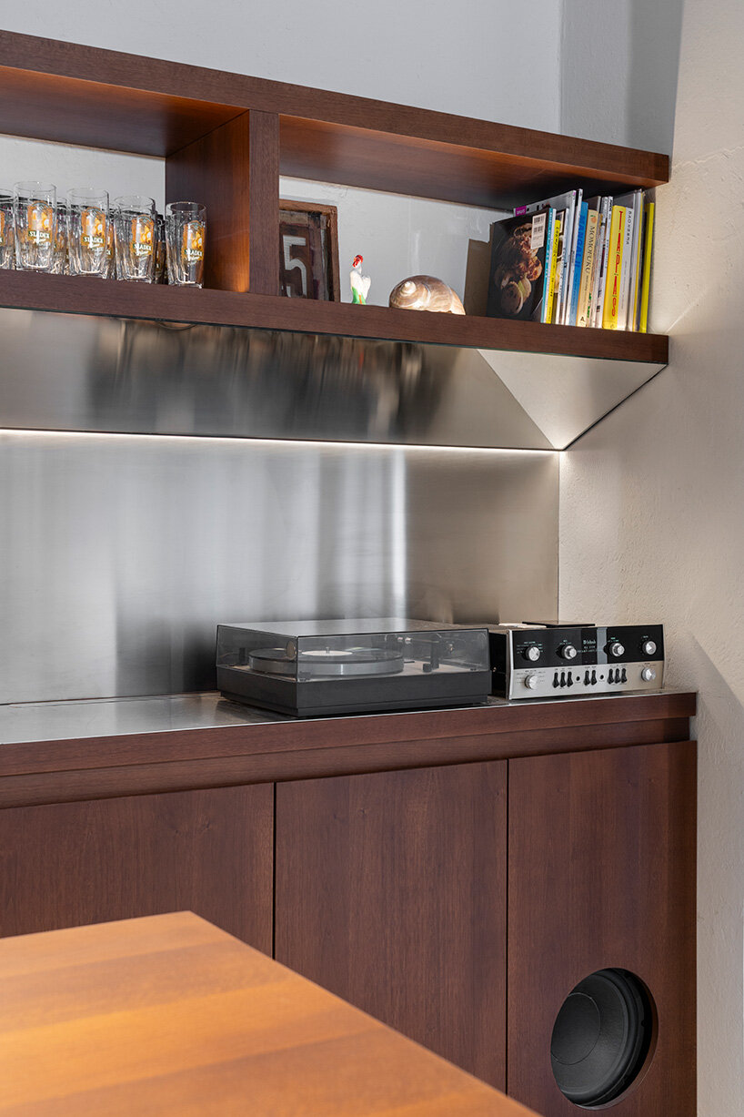 inside this milan wine bar, studiomille creates a cozy gathering space rooted in filipino culture