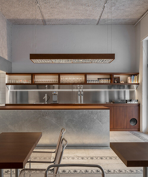 inside this milan wine bar, studiomille creates a cozy gathering space rooted in filipino culture