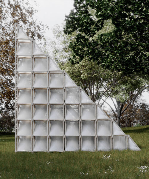 white textile skin over timber frame forms triangular nomadic cabin by celva and saga