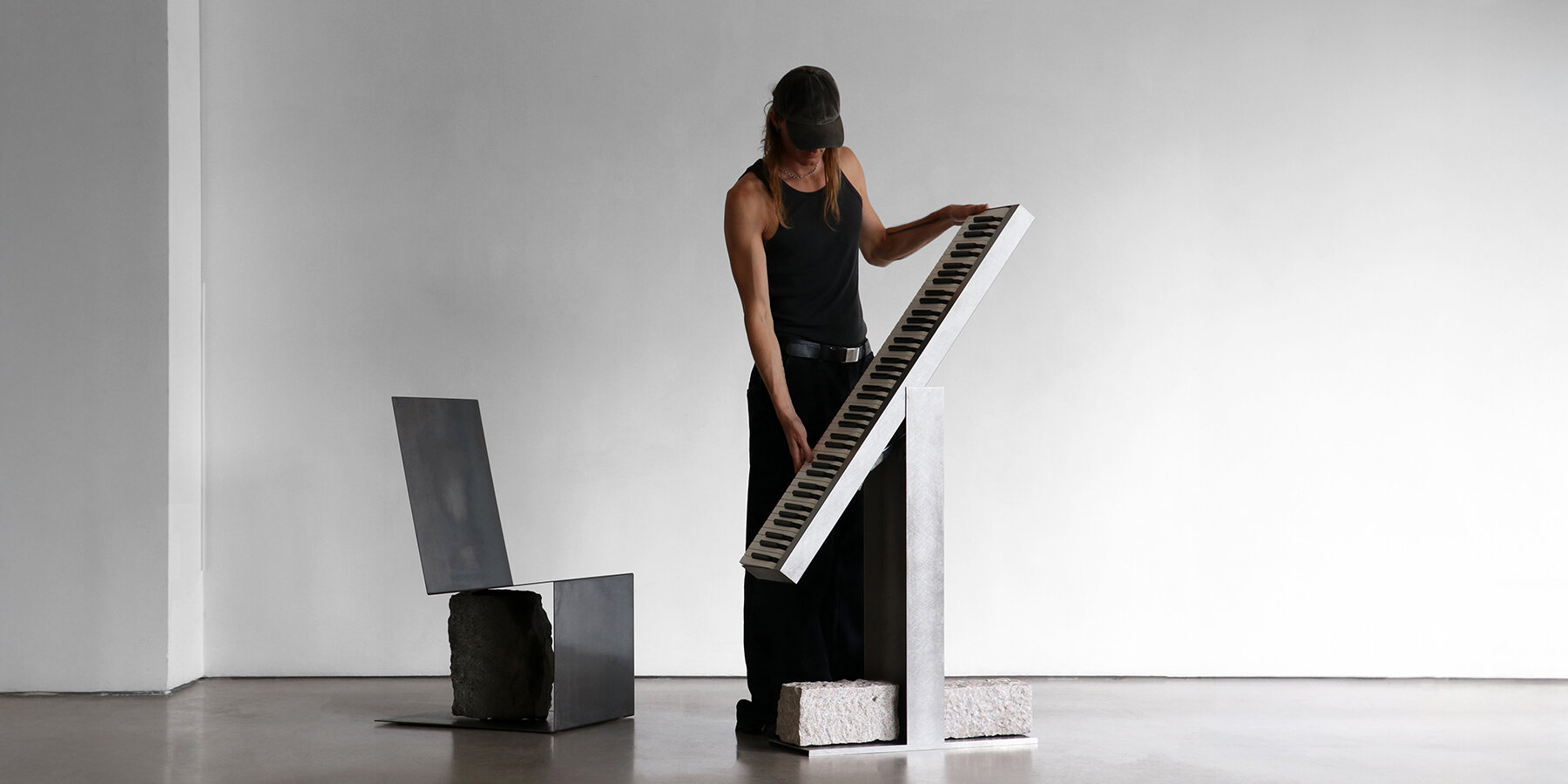 steel-stone-piano-v2-batten-kamp-henry-chu-instrument-sculpture-monolith-designboom-1800-1