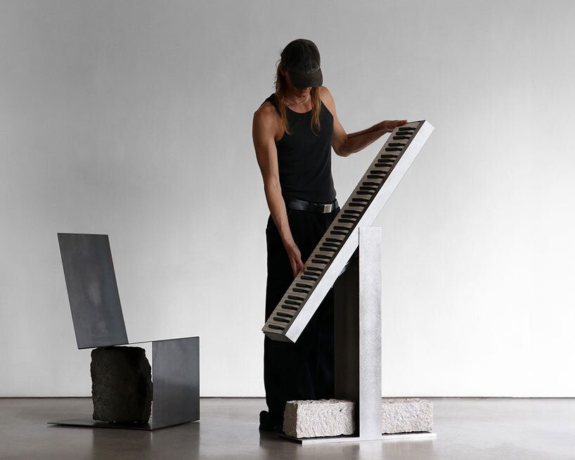 steel and stone piano transforms from electronic instrument to sculptural monolith