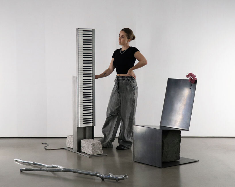 steel and stone piano transforms from electronic instrument to sculptural monolith