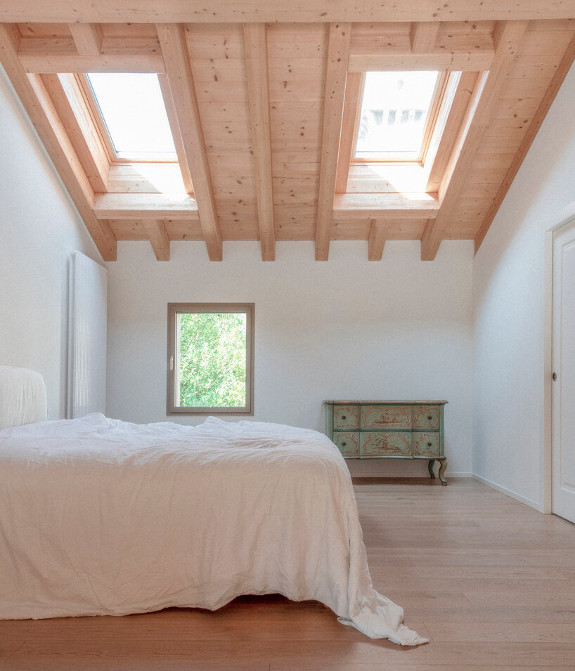 studio bressan transforms italian farmhouse into residence with double-height glass portico