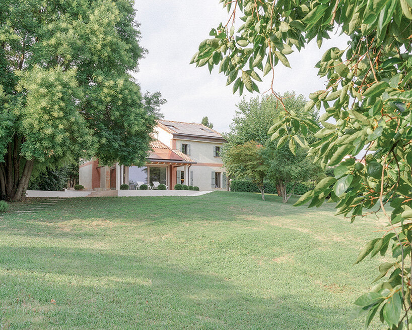 studio bressan transforms italian farmhouse into residence with double-height glass portico