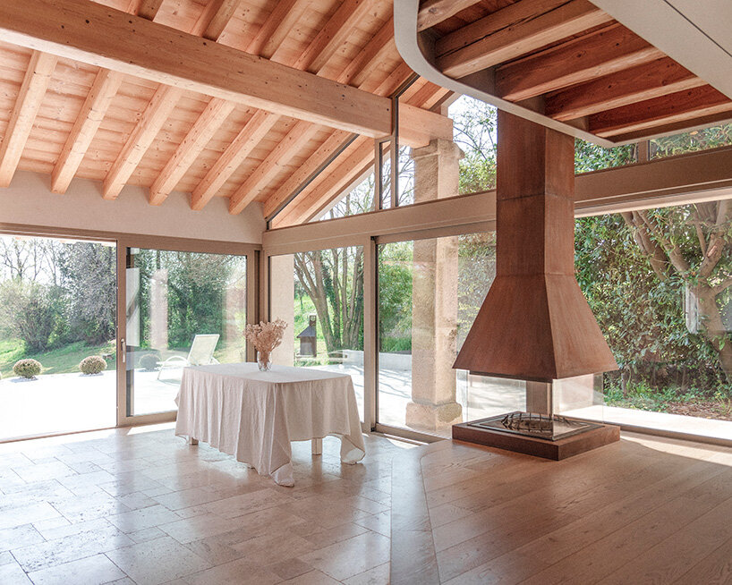 studio bressan transforms italian farmhouse into residence with double-height glass portico