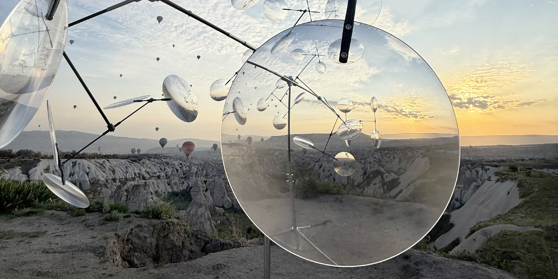 vincent-leroy-floating-lenses-kinetic-sculpture-optical-mobile-cappadocia-designboom-1800-2