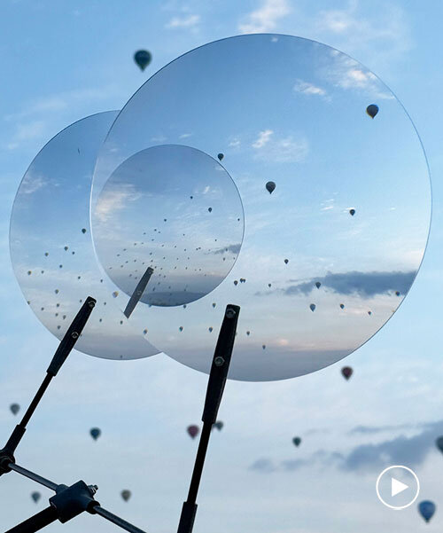 vincent leroy's optical mobile of floating lenses dances with hot air balloons over cappadocia