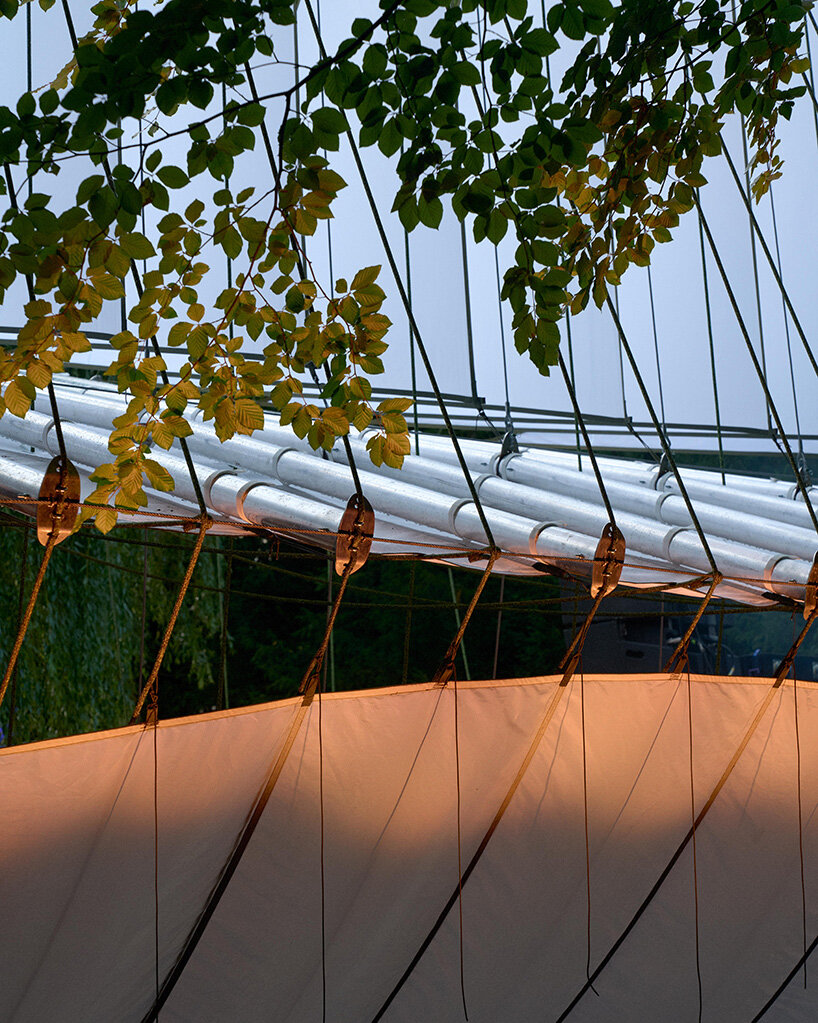 ZELT's curved rain-proof canopy ripples above dekmantel festival stage in the netherlands