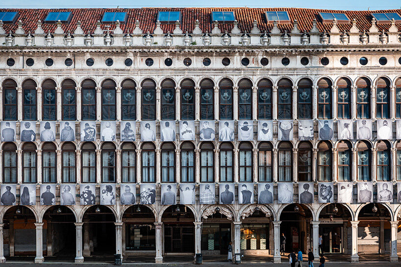 100 large-scale migrant portraits transform venice's iconic procuratie facade