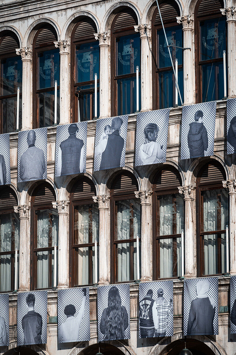 100 large-scale migrant portraits transform venice's iconic procuratie facade
