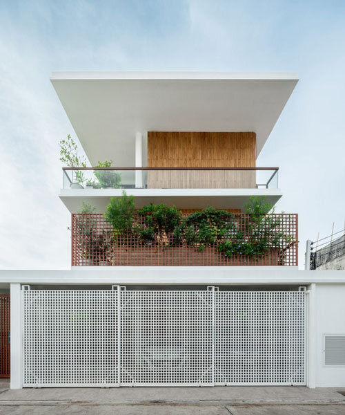 flat12x stacks floating gardens for senior-living house in bangkok