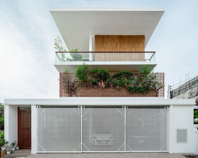 flat12x stacks floating gardens for senior-living house in bangkok