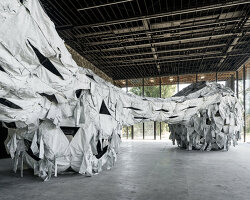 ai weiwei’s installation in ukraine unveils proportioned spheres & dyed camouflage uniforms