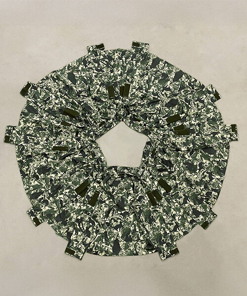 Three Perfectly Proportioned Spheres and Camouflage Uniforms Painted White