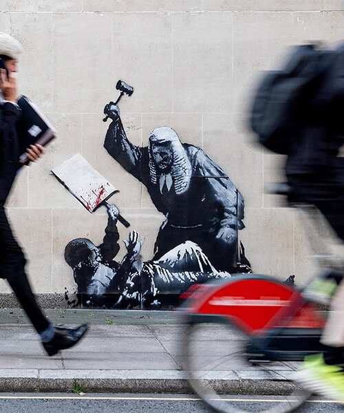 banksy returns with judge-and-protester mural at london's royal courts of justice