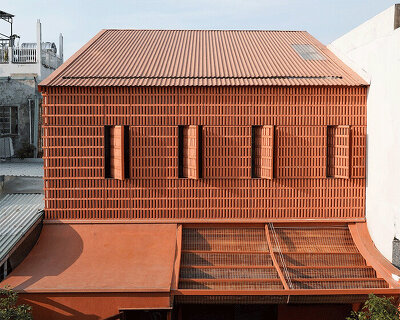 breathable brickwork clads multigenerational home by live out studio in vietnam