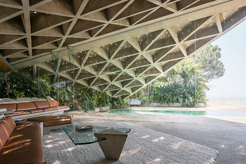 'brutalist interiors' explores hidden life behind concrete facades across the globe