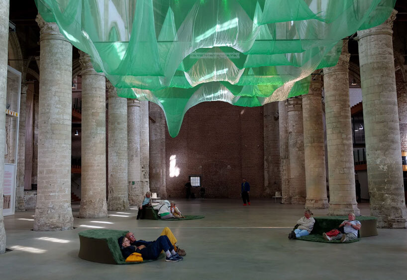 fabric and sound art installations evoke underwater landscape within gothic dutch church