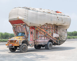 christopher herwig captures the dazzling designs of south asia's trucks and tuk tuks