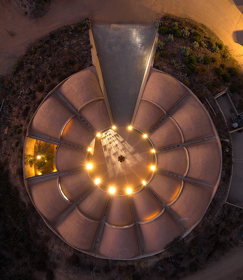 concrete walls shape circular 'pictograma' winery around rain-harvesting courtyard in mexico