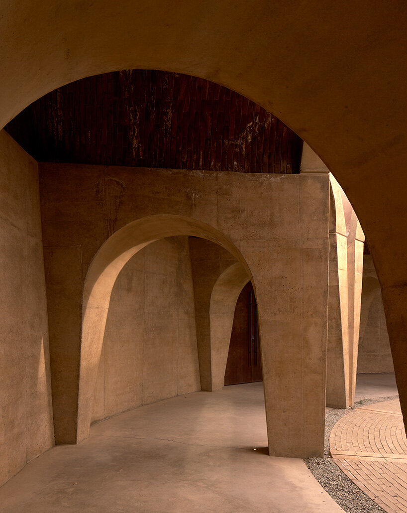 concrete walls shape circular 'pictograma' winery around rain-harvesting courtyard in mexico