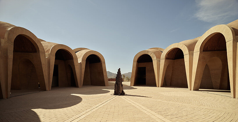 concrete walls shape circular 'pictograma' winery around rain-harvesting courtyard in mexico