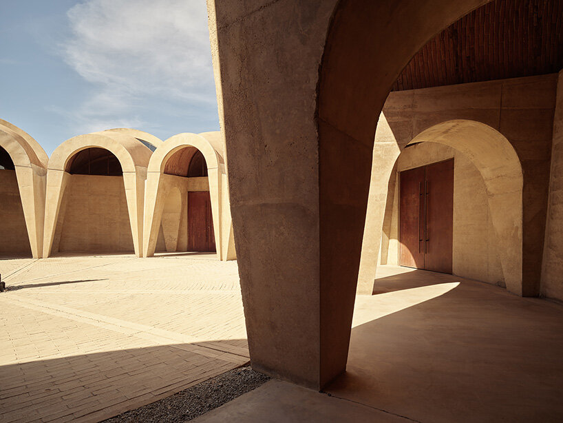 concrete walls shape circular 'pictograma' winery around rain-harvesting courtyard in mexico