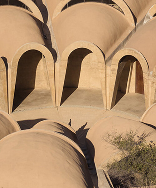 concrete walls shape circular 'pictograma' winery around rain-harvesting courtyard in mexico