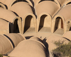 concrete walls shape circular 'pictograma' winery around rain-harvesting courtyard in mexico