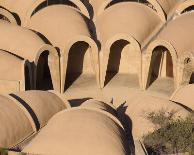 concrete walls shape circular 'pictograma' winery around rain-harvesting courtyard in mexico