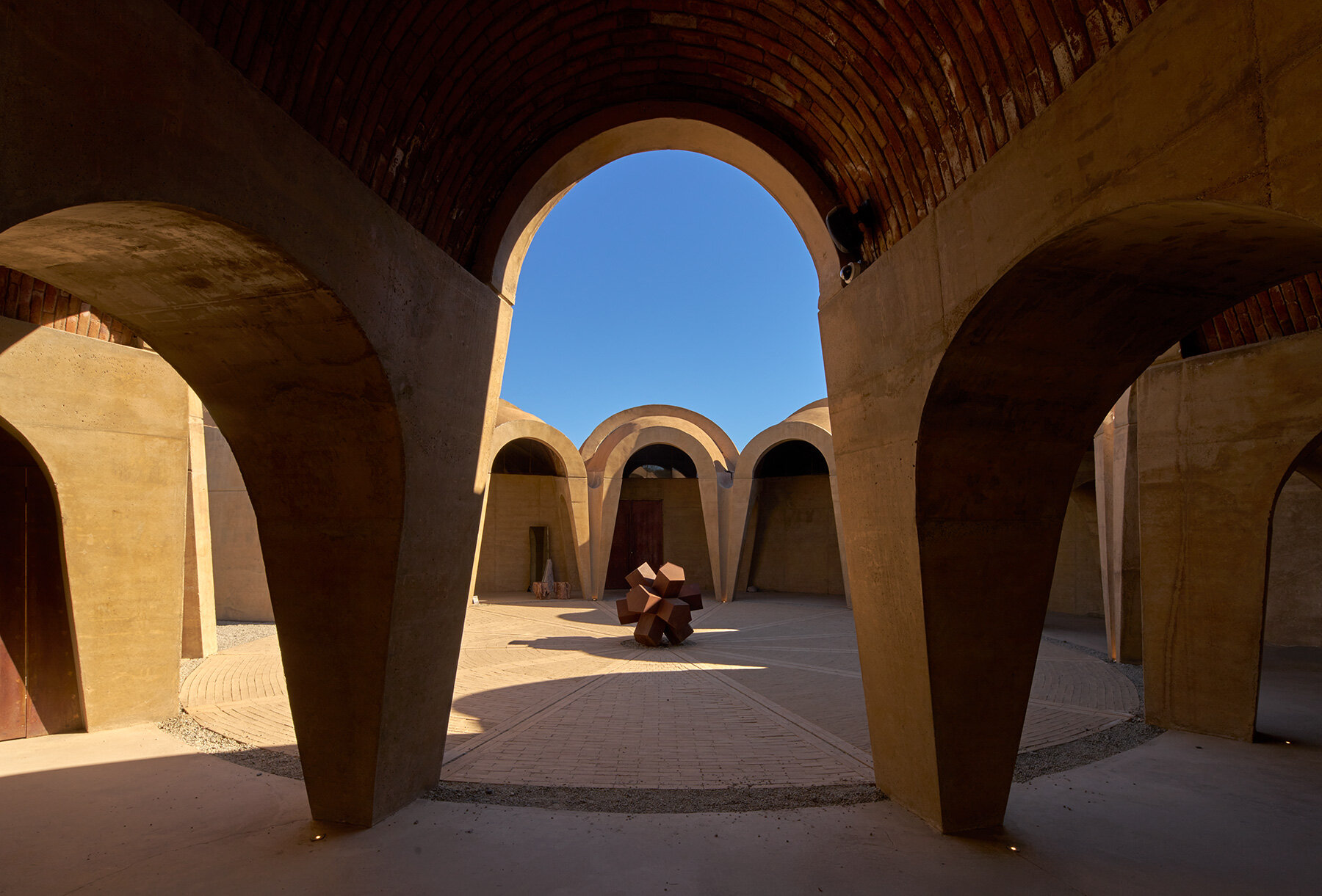 concrete-walls-circular-pictograma-winery-rain-harvesting-courtyard-mexico-rojkind-arquitectos-amasa-estudio-designboom-large03