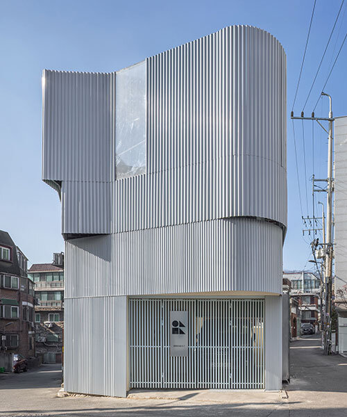 drawing works clads one-person house in seoul with layered corrugated steel facade